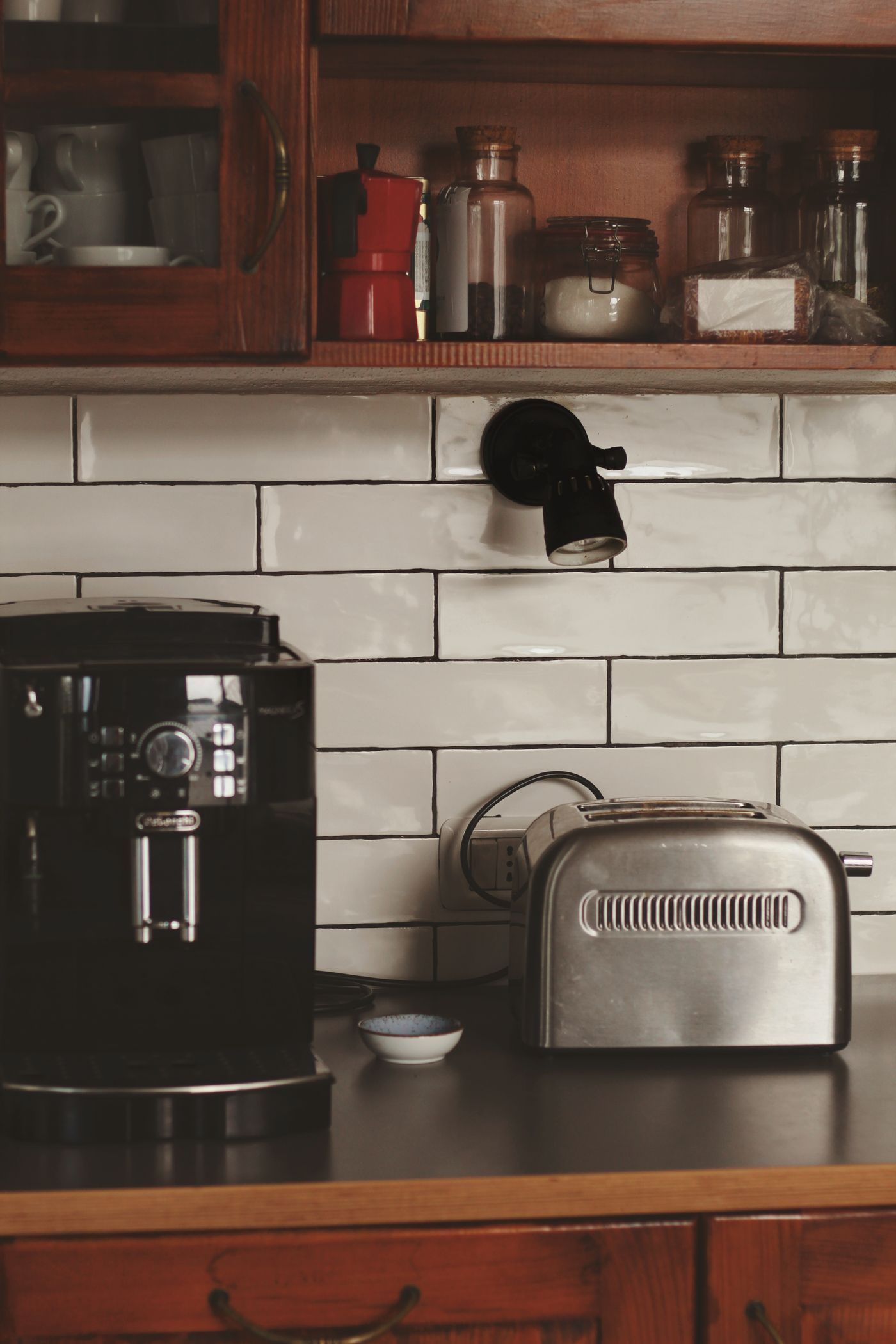 Coffee machine and toaster on kitchen counter