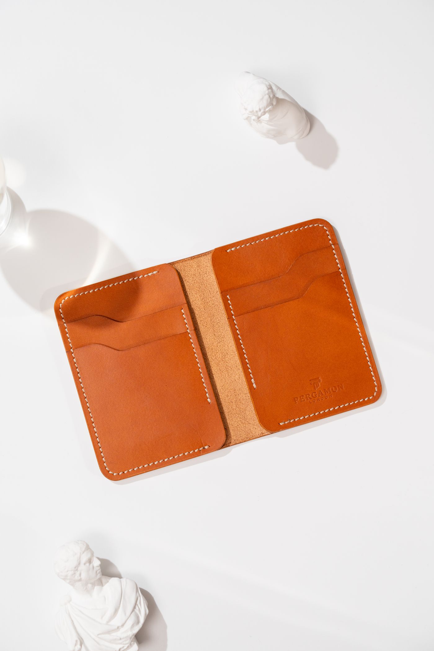 Open leather wallet with visible compartments